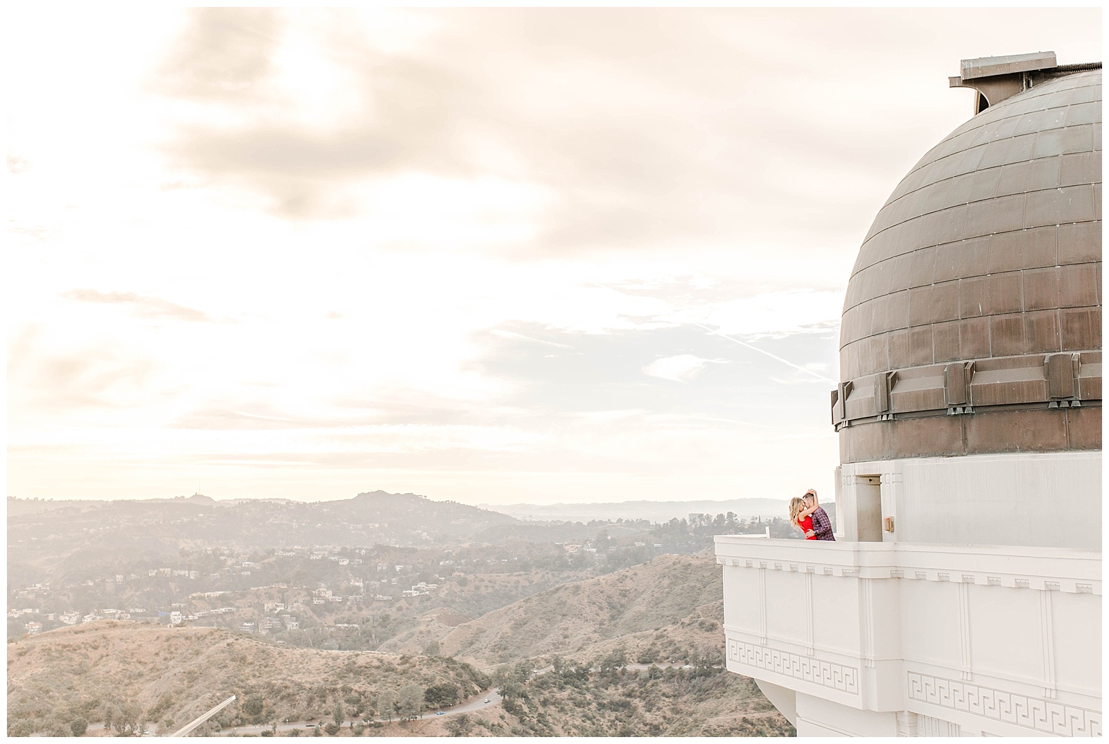 Romantic Photo of Couple Kissing at the Griffith Observatory in LA